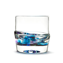 Load image into Gallery viewer, Hand blown glass whiskey glass, clear with a swirl of teal blue and purple glass on the bottom. Colour combination is called &quot;Amethyst Teal.&quot;