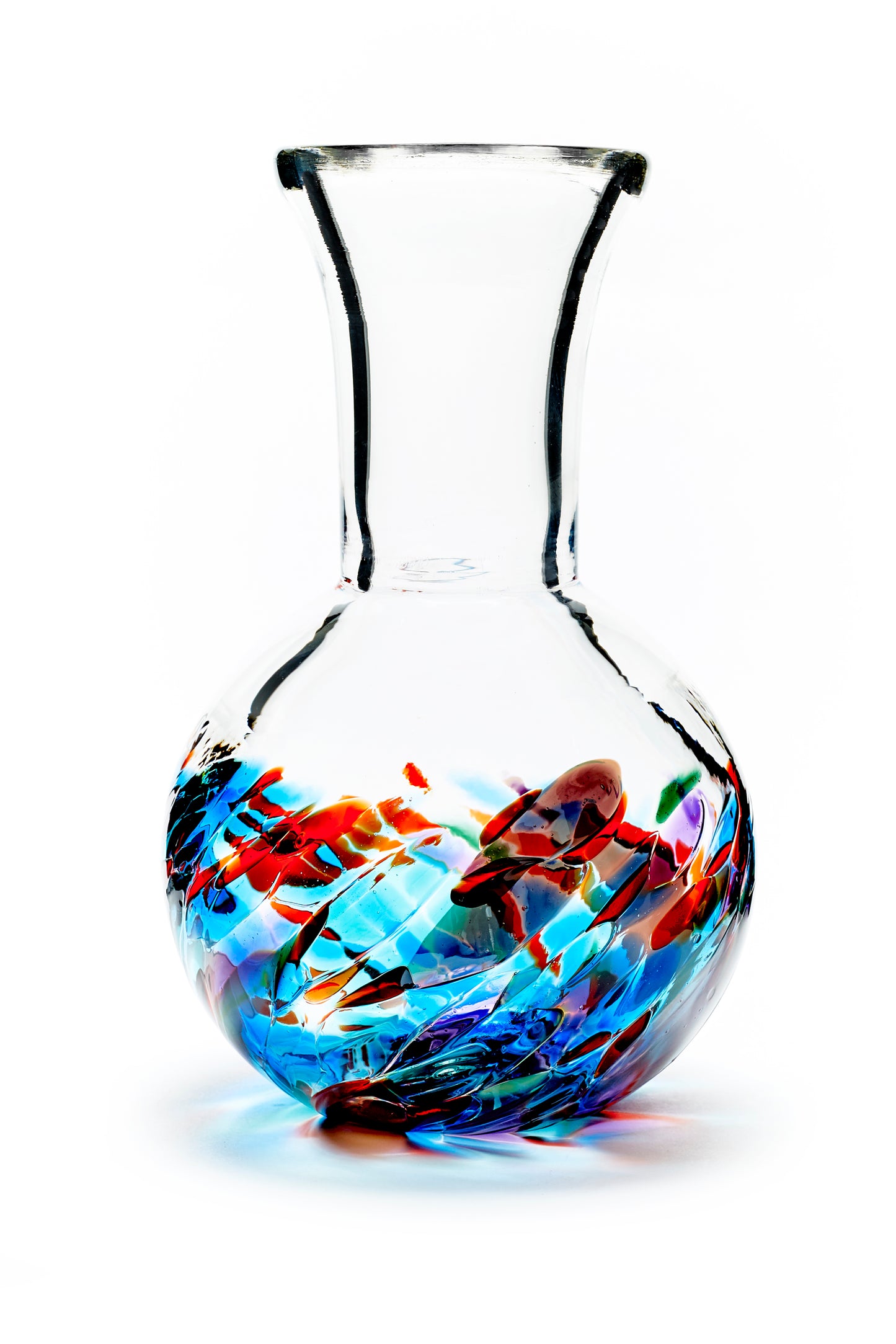 Hand blown glass vase. Red, blue, and purple glass on the bottom. Colour combination is called "Rainbow."