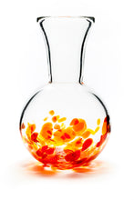 Load image into Gallery viewer, Hand blown glass vase. Red, yellow, and orange glass on the bottom. Colour combination is called &quot;Sunburst.&quot;