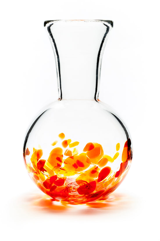 Load image into Gallery viewer, Hand blown glass vase. Red, yellow, and orange glass on the bottom. Colour combination is called &amp;quot;Sunburst.&amp;quot;
