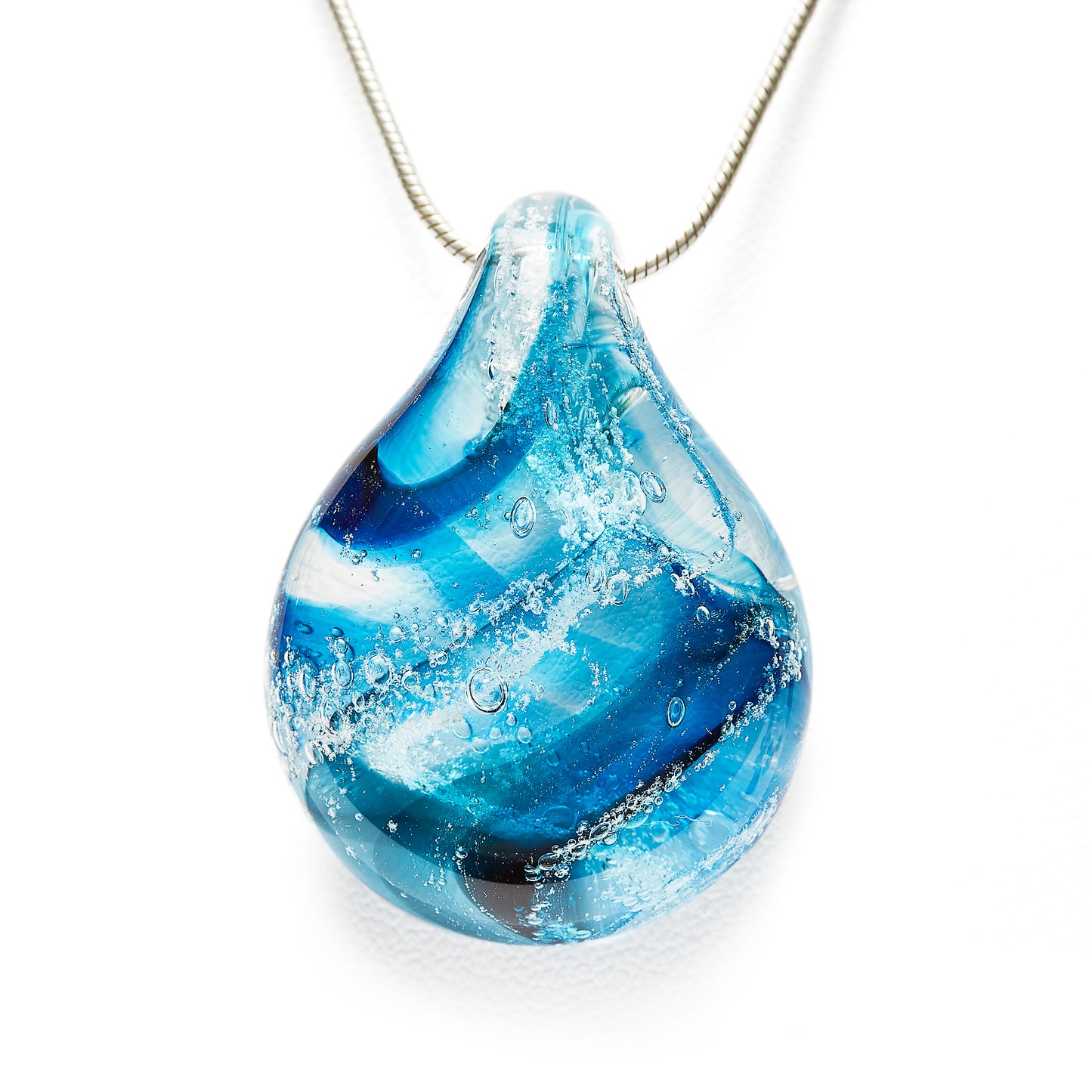 Load image into Gallery viewer, Memorial glass art pendant with cremation ash.  Teal blue glass. Colour combination is called &amp;quot;Ocean Wave.&amp;quot;
