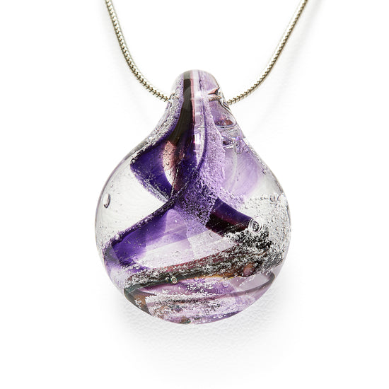 Memorial glass art pendant with cremation ash. Purple and cranberry glass. Colour combination is called "Amethyst."