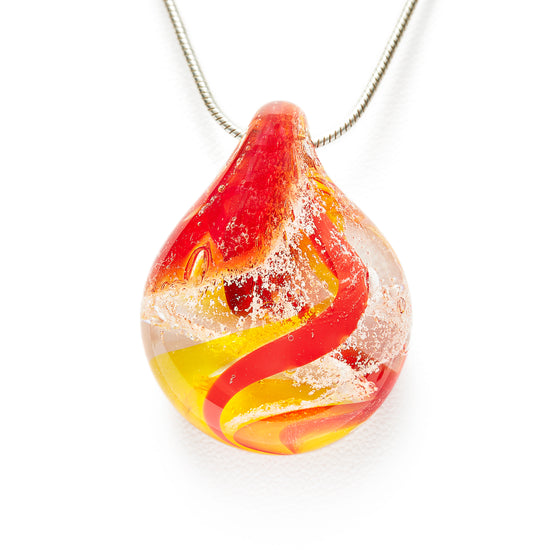 Load image into Gallery viewer, Memorial glass art pendant with cremation ash. Red, yellow, and orange glass. Colour combination is called &amp;quot;Sunburst.&amp;quot;
