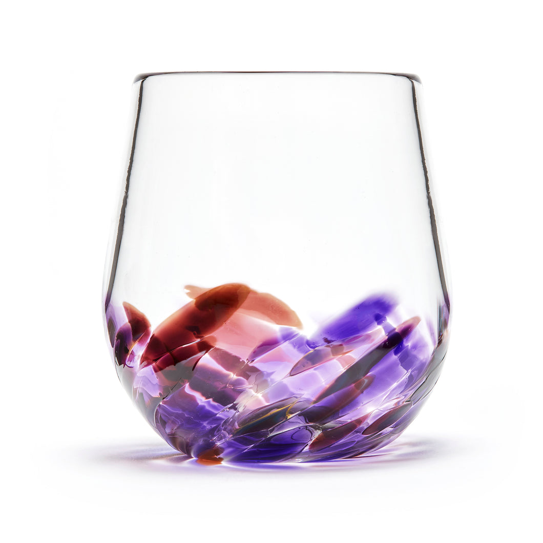 Hand blown glass wine glass. Clear glass with a swirl of purple and cranberry glass on the bottom. Colour combination is called 
