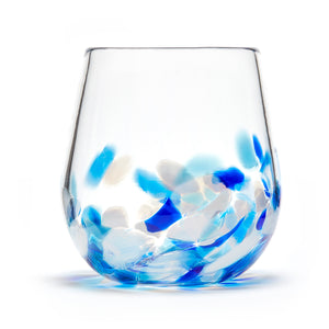 Hand blown glass wine glass. Clear glass with a swirl of cobalt blue, teal blue, and white glass on the bottom. Colour combination is called "Winter."
