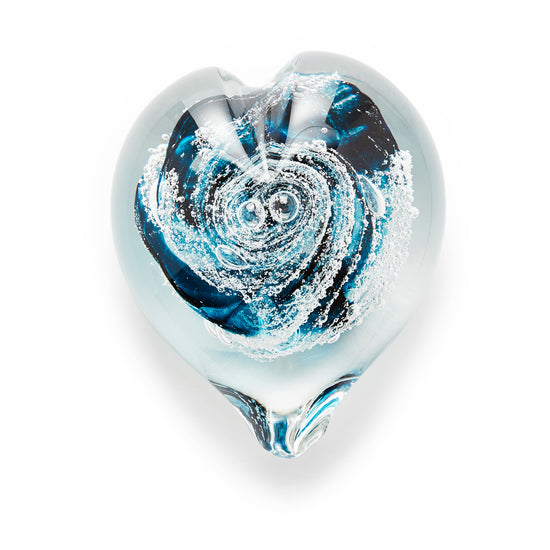 Load image into Gallery viewer, Memorial glass art heart paperweight with cremation ash. Teal blue glass. Colour combination is called &amp;quot;Ocean Wave.&amp;quot;
