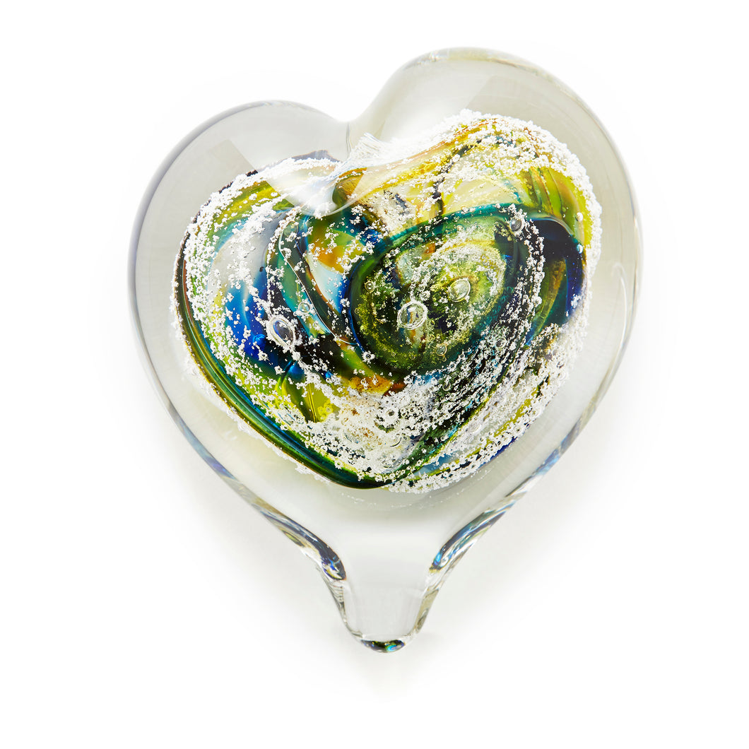 Memorial glass art heart paperweight with cremation ash. Purple, blue, green, pink, and yellow glass. Colour combination is called 
