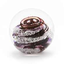 Load image into Gallery viewer, Round memorial glass art paperweight with cremation ash. Purple and cranberry glass. Colour combination is called &quot;Amethyst.&quot;