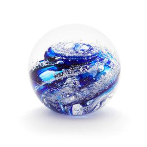 Round memorial glass art paperweight with cremation ash. Cobalt blue glass.