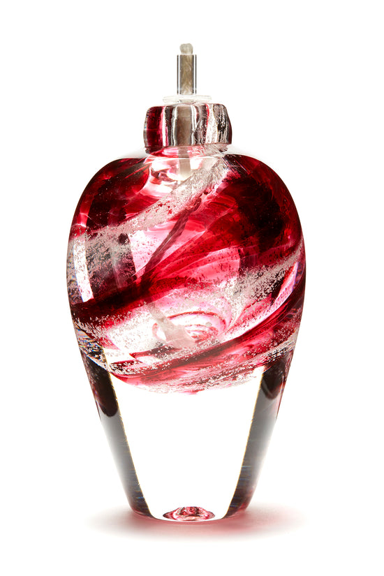 Memorial glass art tall eternal flame oil lamp with cremation ash. Cranberry glass.