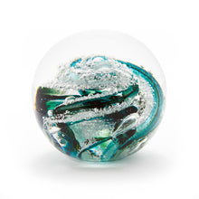Load image into Gallery viewer, Round memorial glass art paperweight with cremation ash. Green glass. Colour combination is called “Emerald.”