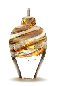 Memorial glass art tall eternal flame oil lamp with cremation ash. Iris gold glass.