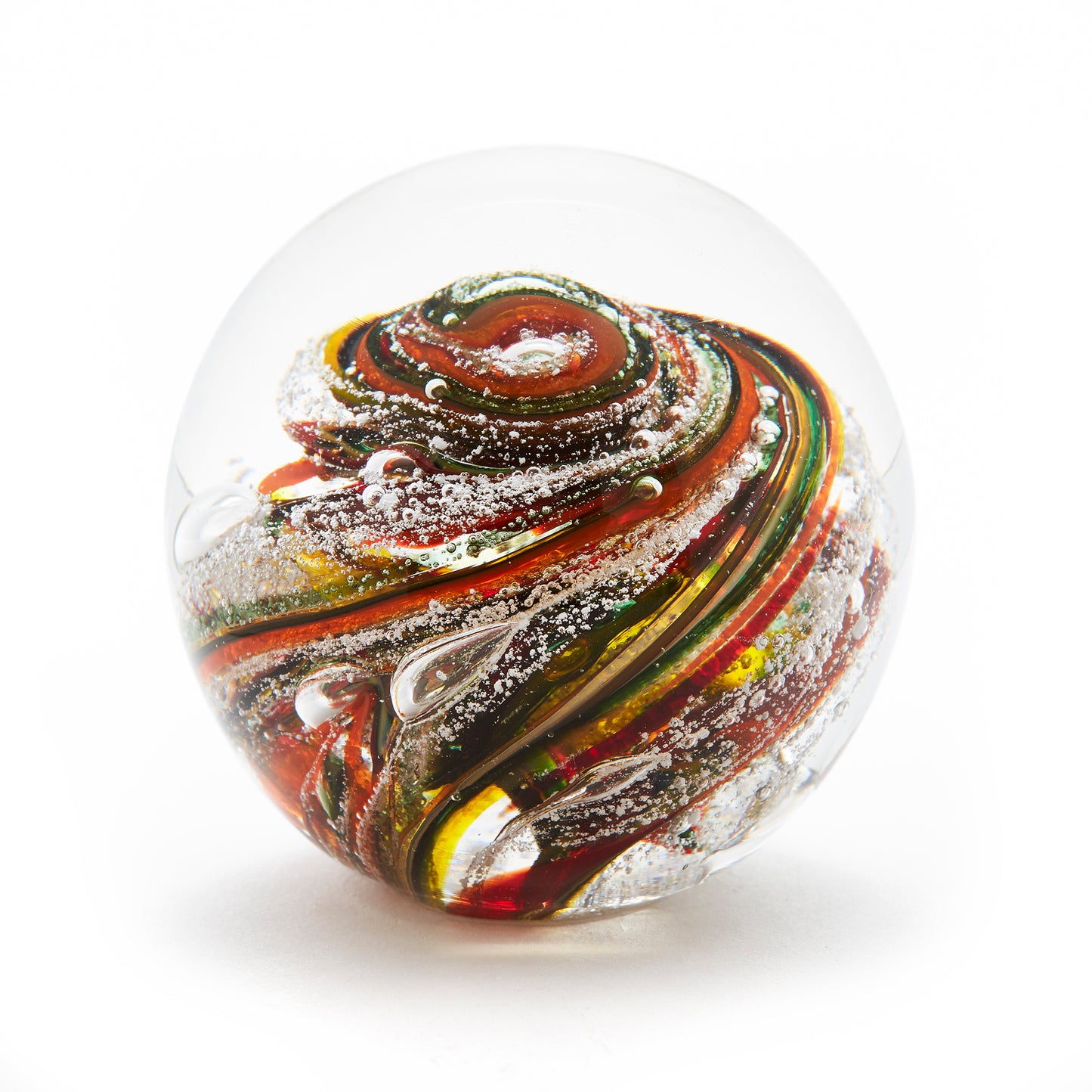 Load image into Gallery viewer, Round memorial glass art paperweight with cremation ash. Yellow, red, orange, and green glass. Colour combination is called &amp;quot;Autumn.&amp;quot;

