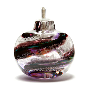 Round memorial glass art eternal flame oil lamp with cremation ash. Purple and cranberry glass. Colour combination is called "Amethyst."
