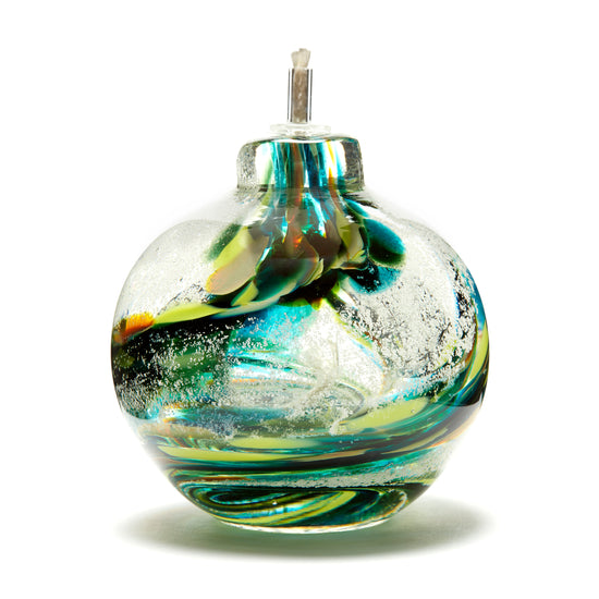 Load image into Gallery viewer, Round memorial glass art eternal flame oil lamp with cremation ash. Teal blue, yellow, and green glass. Colour combination is called &amp;quot;Summer.&amp;quot;
