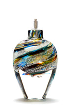 Load image into Gallery viewer, Memorial glass art tall eternal flame oil lamp with cremation ash. Red, blue, purple, and green glass. Colour combination is called &quot;Carnival.&quot;