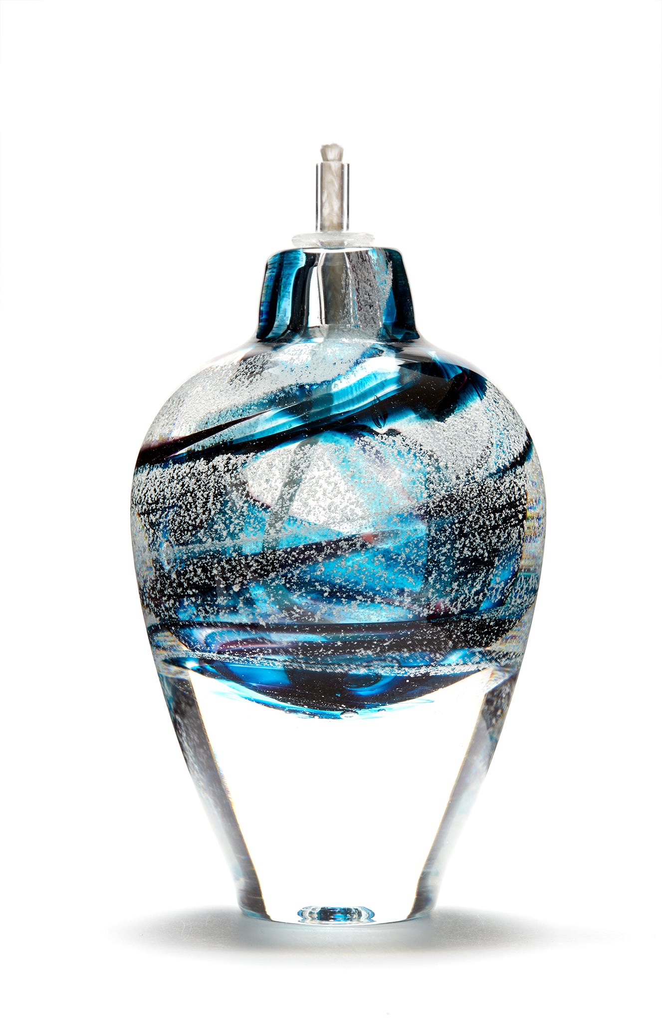 Memorial glass art tall eternal flame oil lamp with cremation ash. Teal blue and purple glass. Colour combination is called "Amethyst Teal."