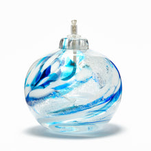 Load image into Gallery viewer, Round memorial glass art eternal flame oil lamp with cremation ash. Cobalt blue, teal blue, and white glass. Colour combination is called &quot;Winter.&quot;