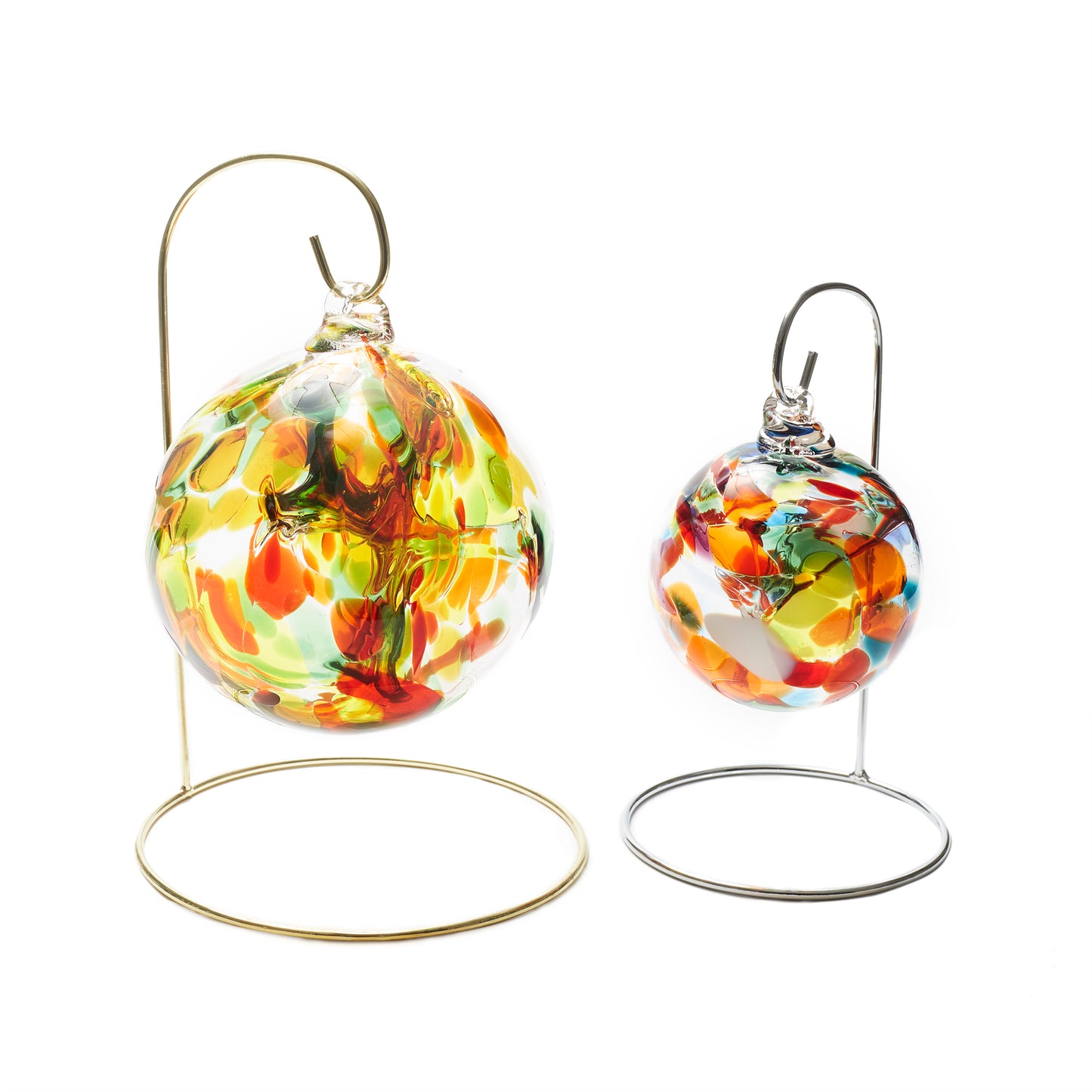 Load image into Gallery viewer, Small silver stand and small gold stand for hand blown glass balls.

