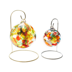 Small silver stand and small gold stand for hand blown glass balls.