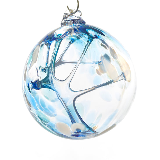 Hand blown glass witch ball. Cobalt blue, teal blue, and white glass. Colour combination is called "Winter."